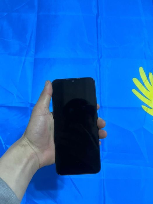 Редми телефон сатылады