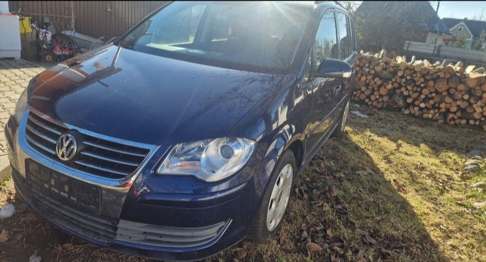 Vw touran 2.0 2009 cu 7locuri vand schimb