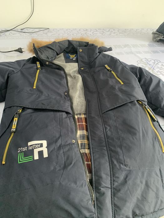 Продам зимний пуховик