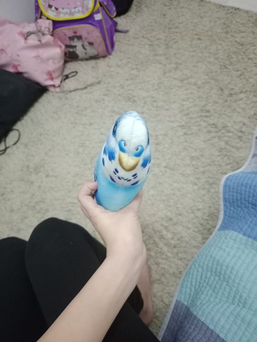 Продам игрушку-попугай