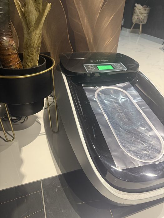 Aparat pentru acoperirea pantofilor  DR.MAYER