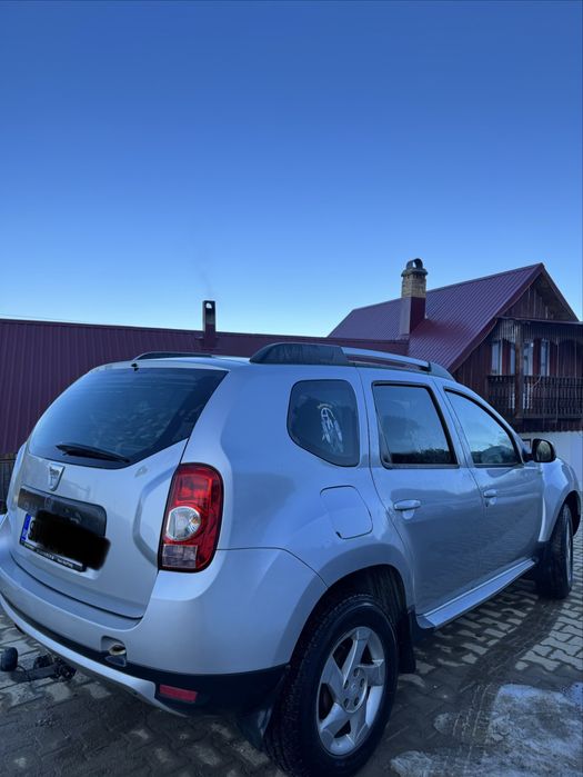 Dacia Duster 1.6 benzină,105 cp,4x4 la buton