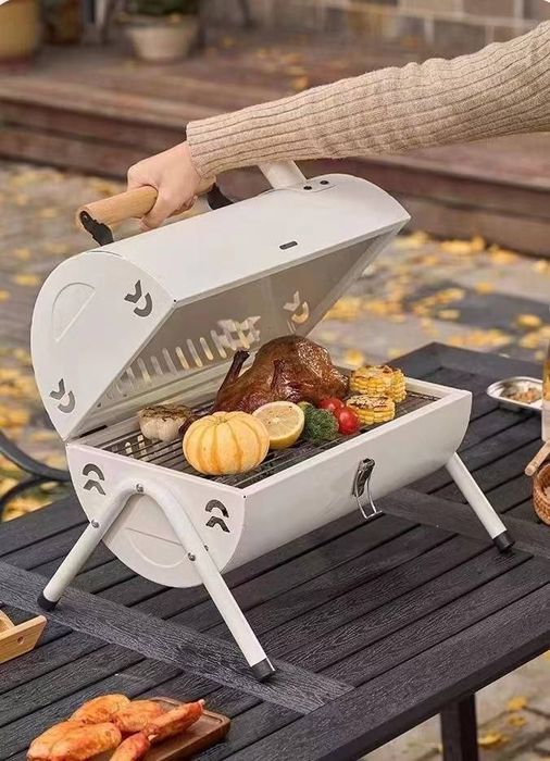 Складной двухсторонний уличный гриль для барбекю.