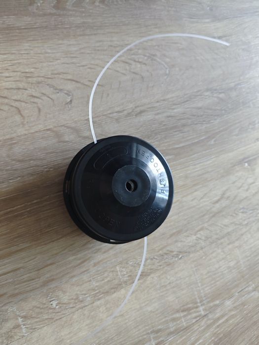 Катушка для триммера с леской.