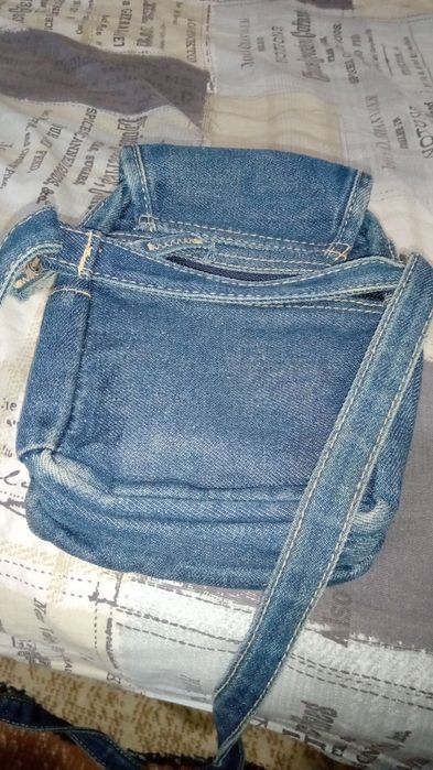 Оригинална чантичка Tomi Lee