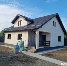 Vând case modulare pe structură metalică învelit cu panouri sandwich