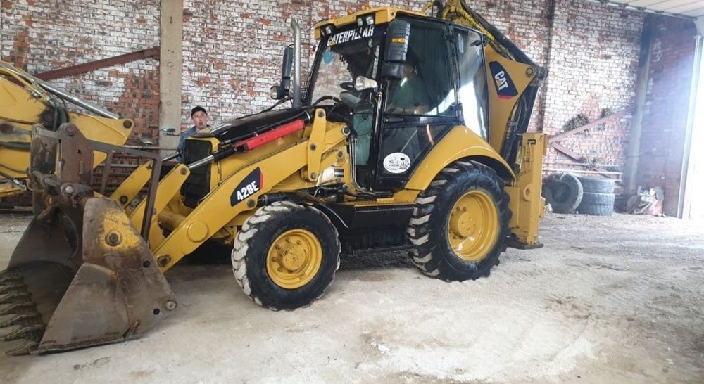 Экскаватор Погрузчик CAT428E