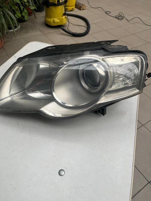 Far Stânga VW Passat B6 (2005-2010) Original HELLA - Cu Lupă