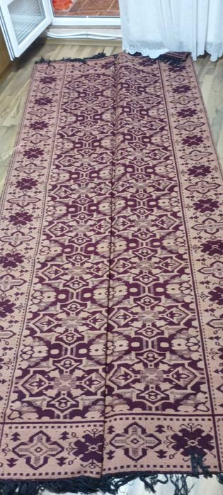 Ръчно тъкан килим