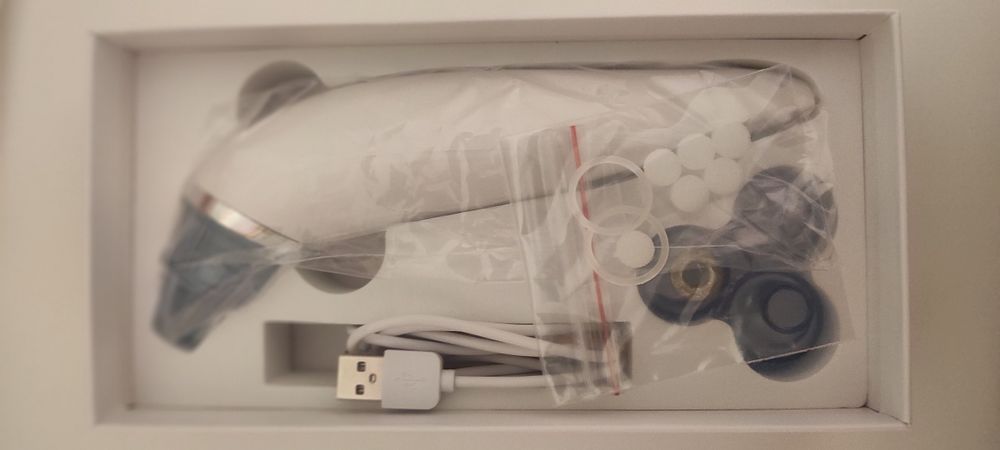 Уред за премахване на черни точки и масаж на лице