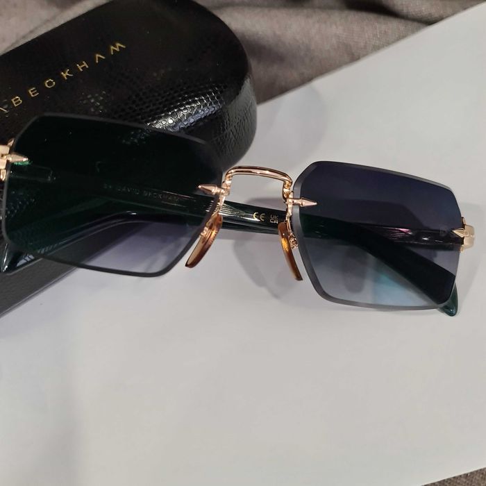 Солнцезащитные очки DB.