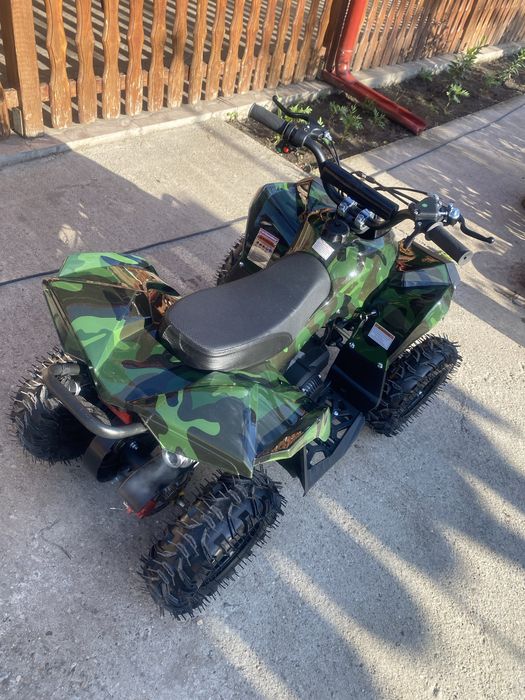 Atv copii 3-10 ani pe benzină .Este nou cumpărat pentru nepoată , dar nu vrea să meargă cu el