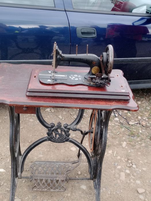 Mașină de cusut vintigi