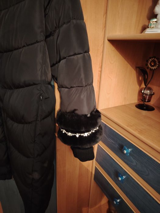 Продам пуховик женский