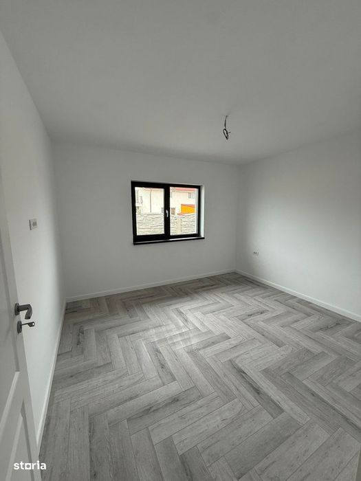 Casa pe parter cu 4 camere , incalzire in pardoseala , teren 400 mp