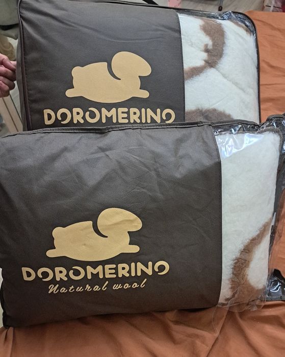 Тёплое одеяло бренда DOROMERINO
