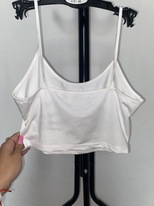 top scuet cu maini de scheleton