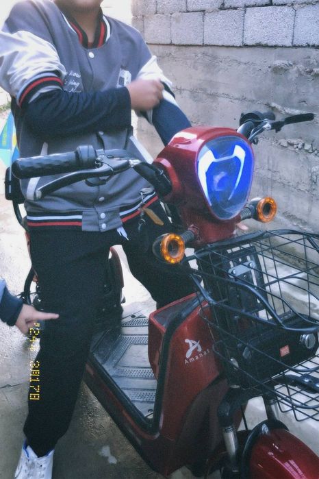 Электроскутер аманат