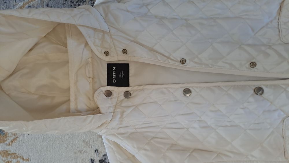 Куртки и пуховики