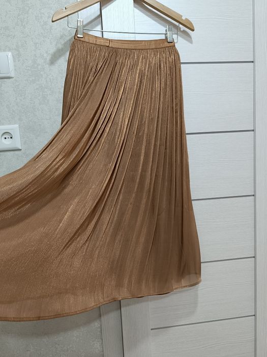 Женские плиссированные юбки