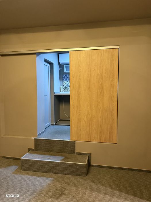 Apartament cu garaj, grădină, aer conditionat și centrală proprie