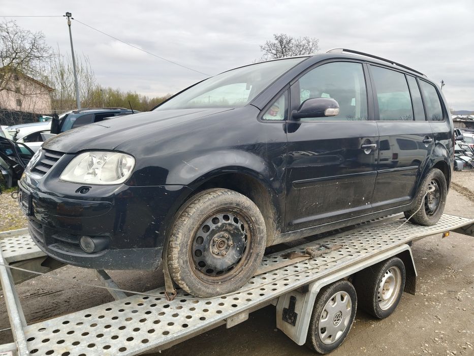 Piese motor cutie capota bara punte jug scaune faruri stopuri cârlig modul planșa trager radiatoare fuzeta modul caseta direcție  vw Touran 2.0tdi bmm