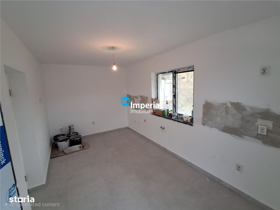 Casa plan parter de vanzare in zona Bucium Visan