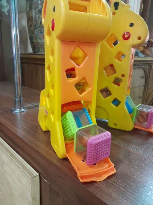 Продам игрушку жирафика