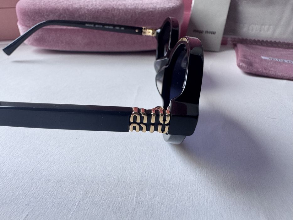 Ochelari de soare Miu Miu Oval SMU04Z 50-18 140, Noi