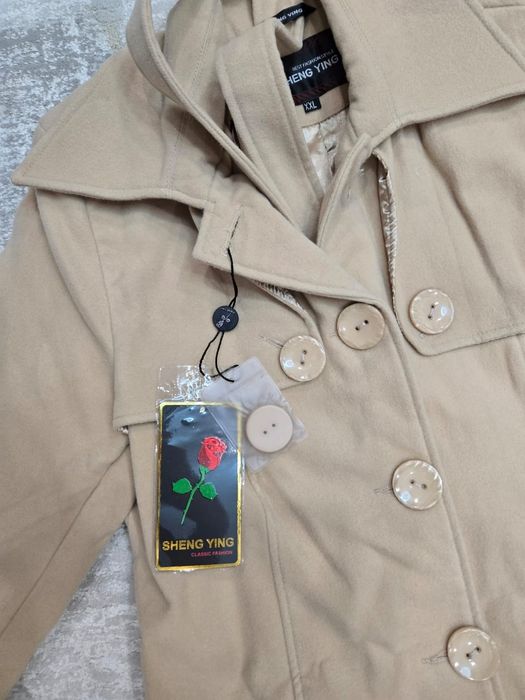 Продам пальто новое