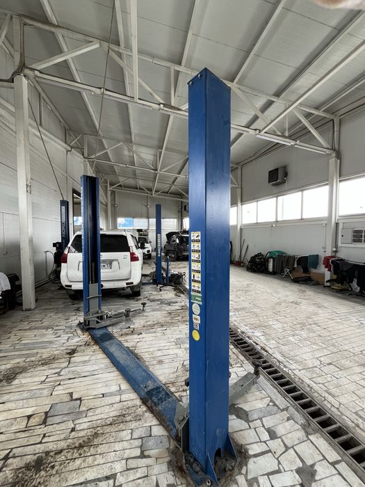 Подьемник для автосервиса