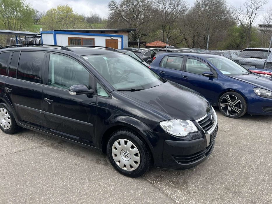 Vw Tuaran 1.9 105кс.код на мотора BLS 2009г.