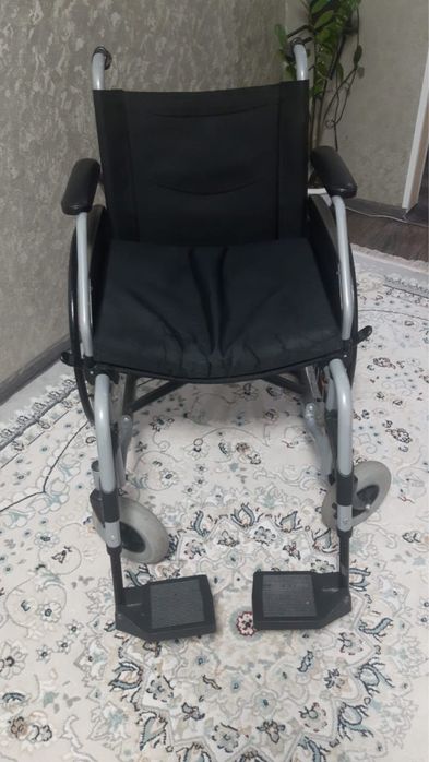 Продам кресло-коляску для инвалидов