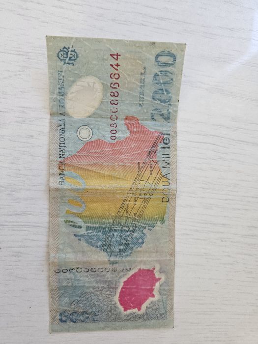 Vand bancnotă 2000 lei cu eclipsa 1999