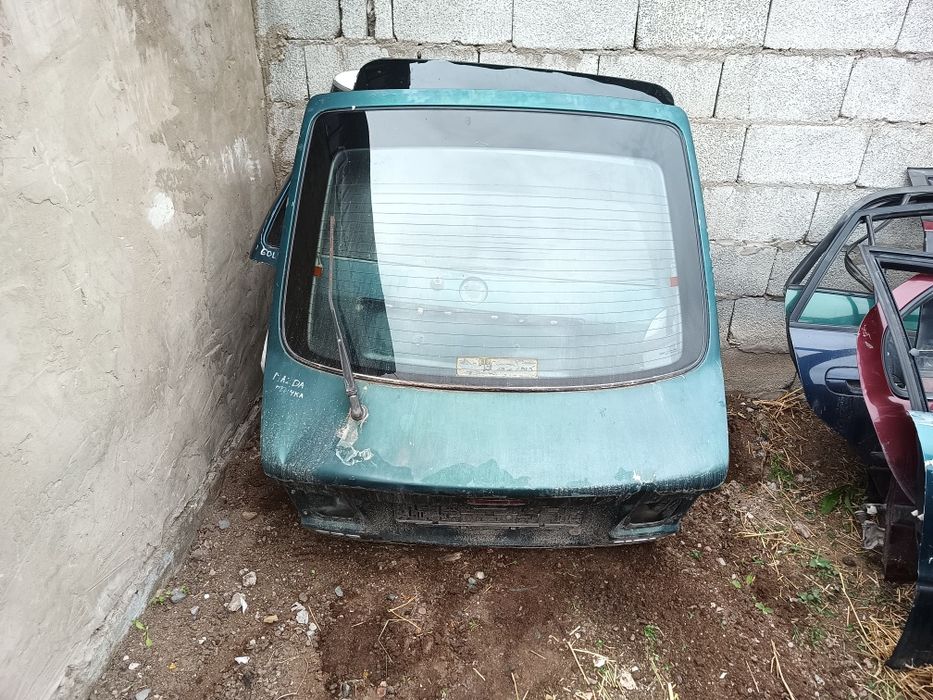 Разные двери Ауди Ниссан примера