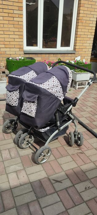 Десткая коляска двойная