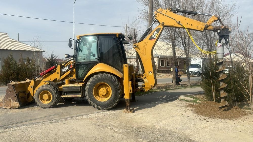 Экскаватор погрузчик 3/1