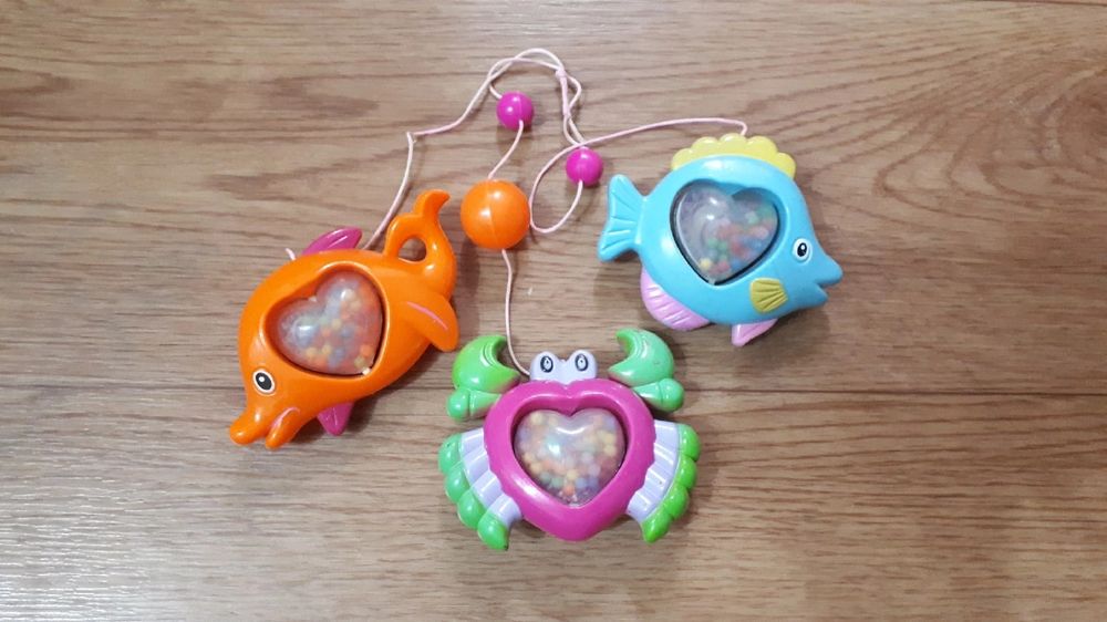 Игрушки погремушки для малыша