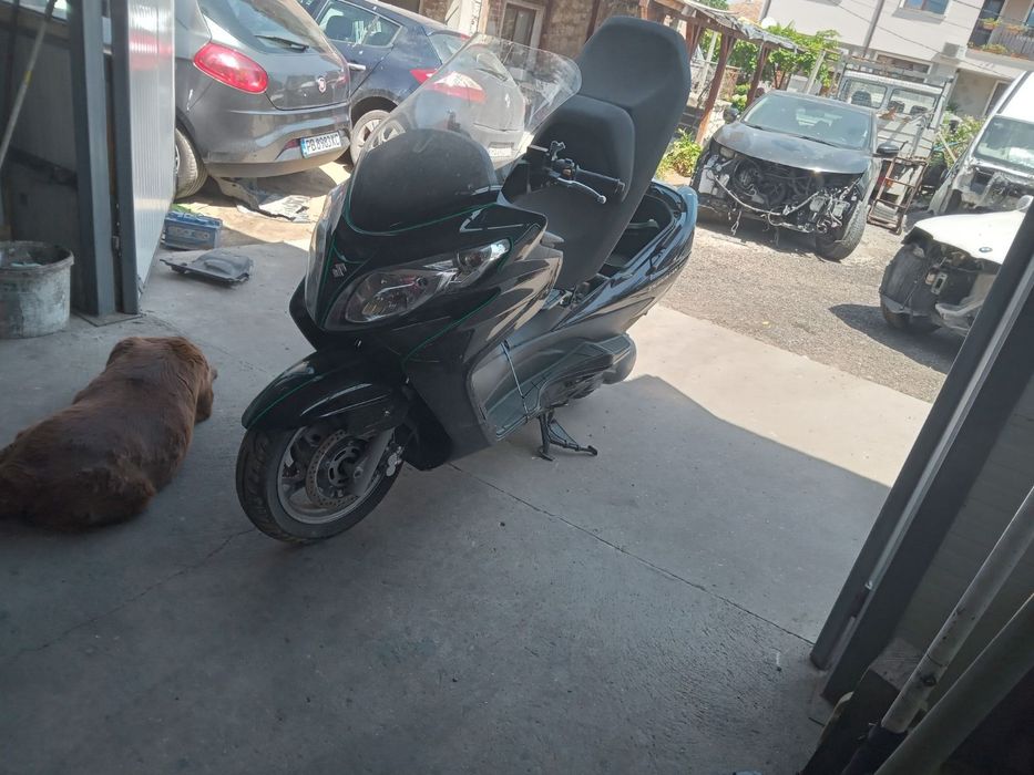Сузуки Бургман на части