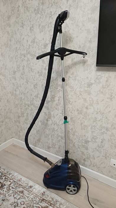 Паровой утюг работает