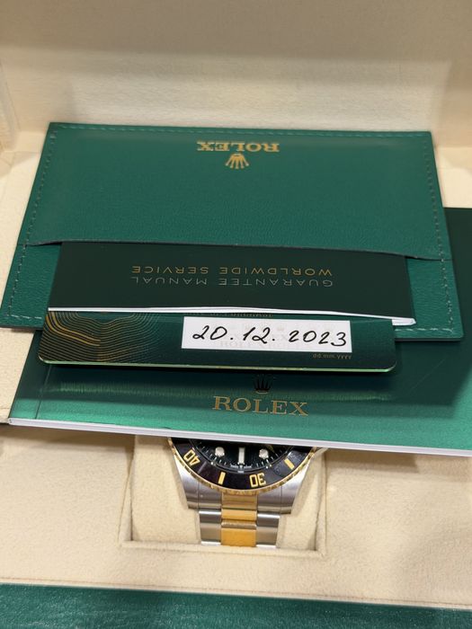 Rolex submariner date gold/steel