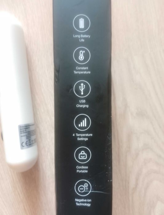 Perie pentru îndreptat părul cu efect de placă
