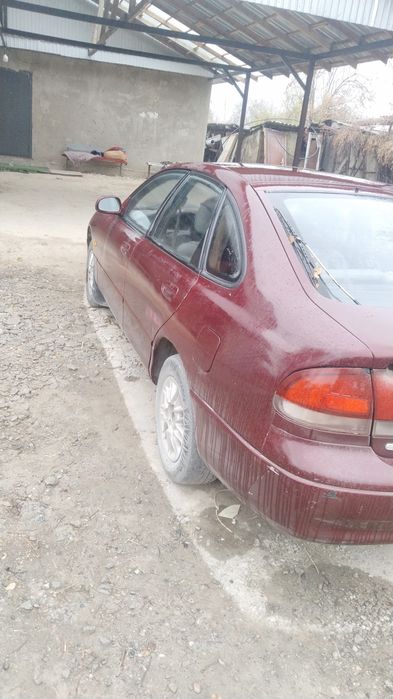 Машина Mazda кронс