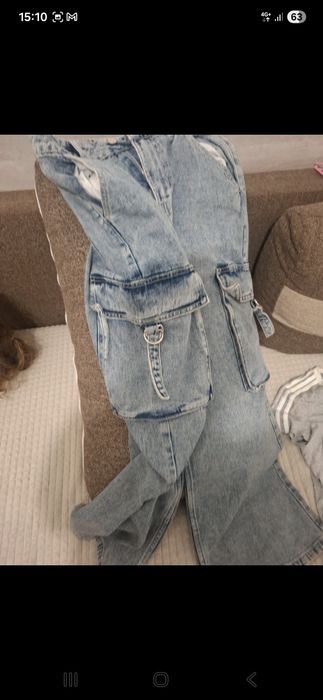 Blugi largi fete cu buzunare in parti