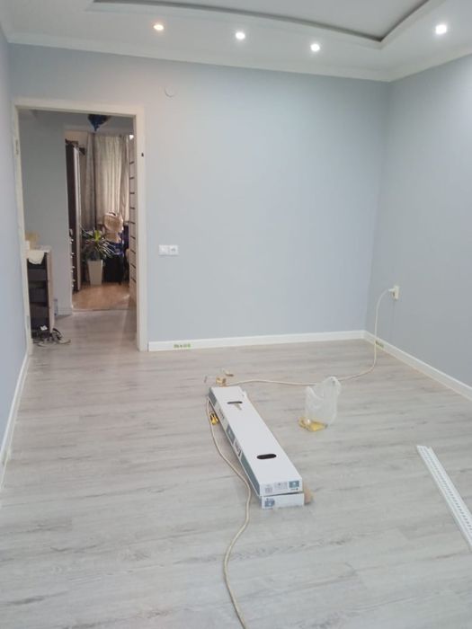 Укладка ламината,плинтусов,