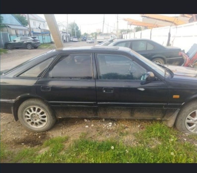 Продам запчасти на Мазда 626