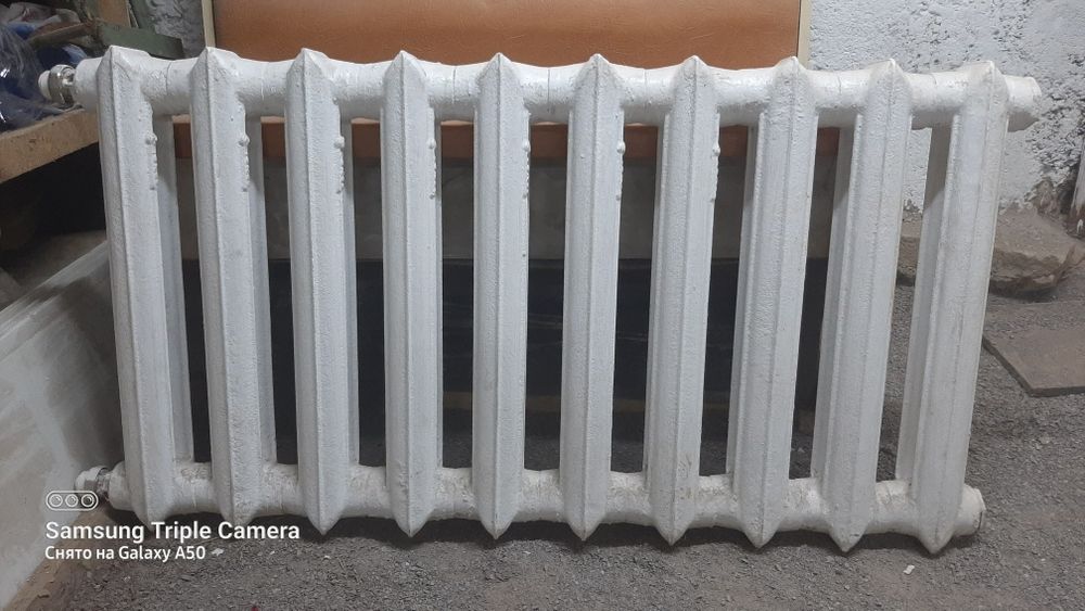 Батареи чугунные 10 секций.