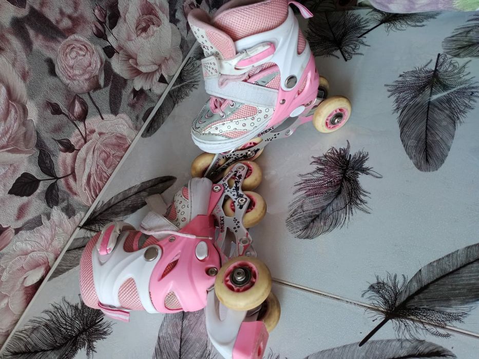 Коньки роликовые