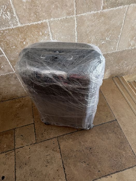 Troler Samsonite mare-bagaj de cala , 4 roti-doar cu predare in Bucuresti