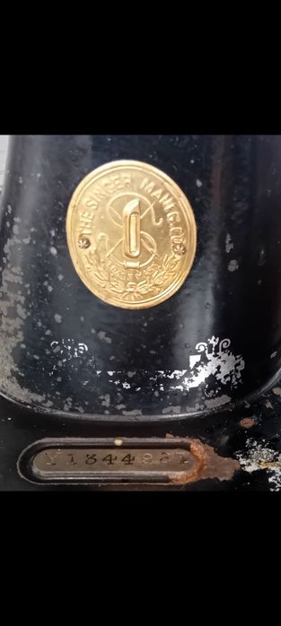 Mașină de cusut singer